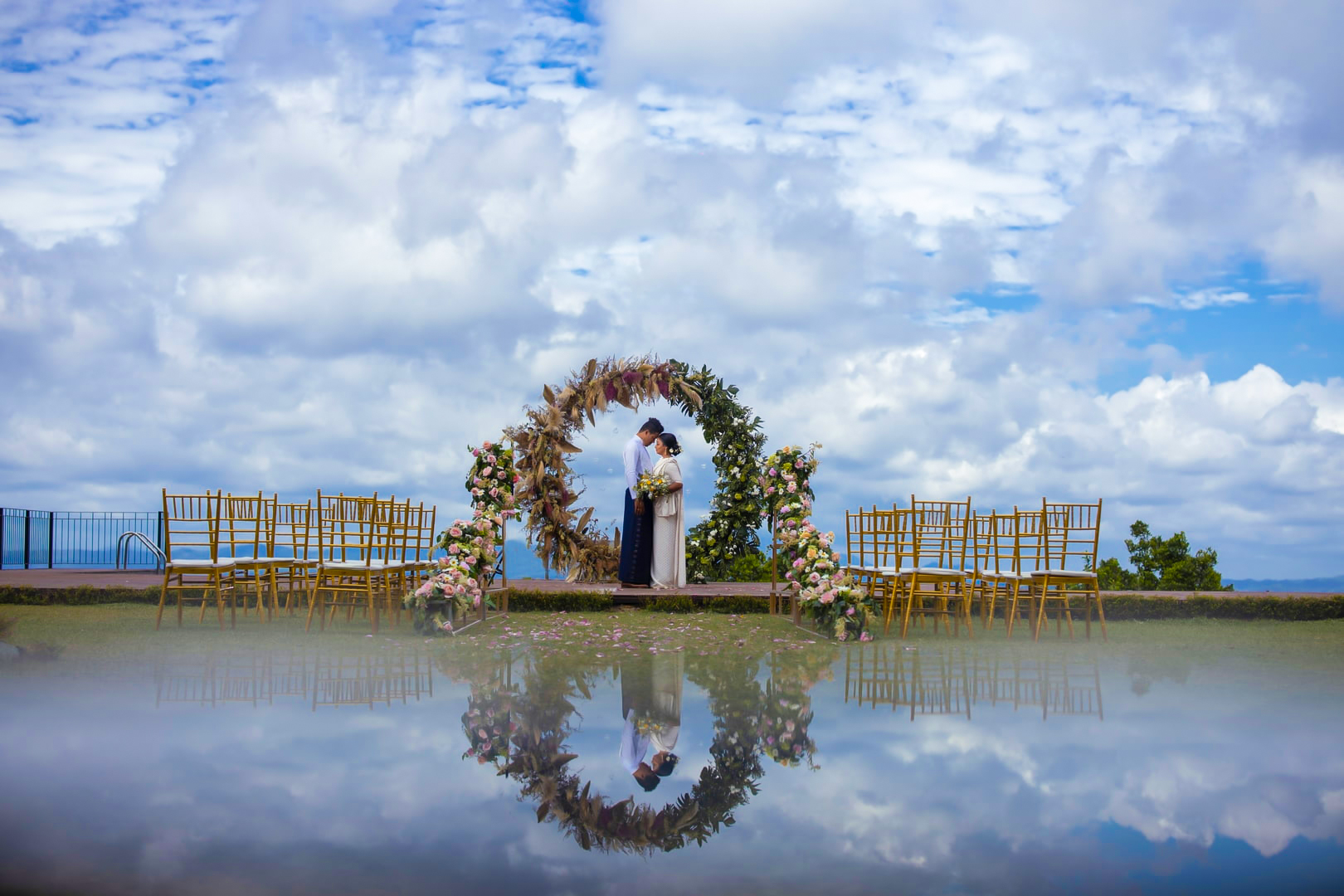 Outdoor wedding ceremony overlooking the hills at Simpson's Forest