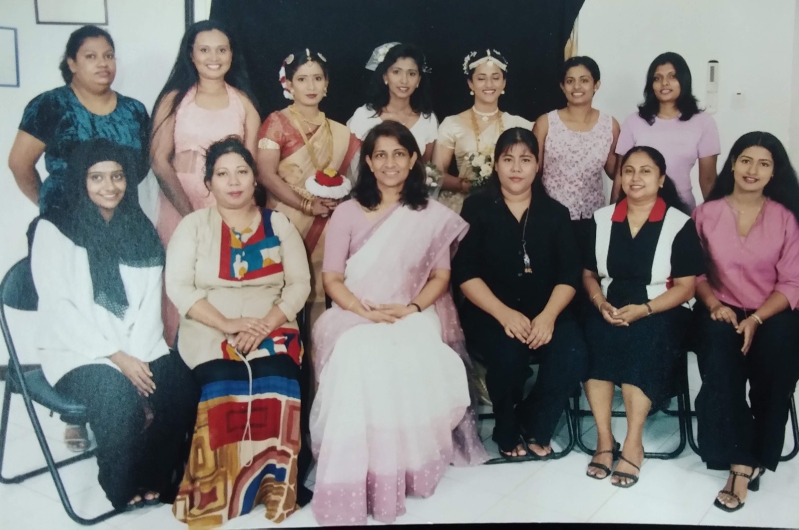 Nayana Karunaratne with a group of beauty professionals and bridal models