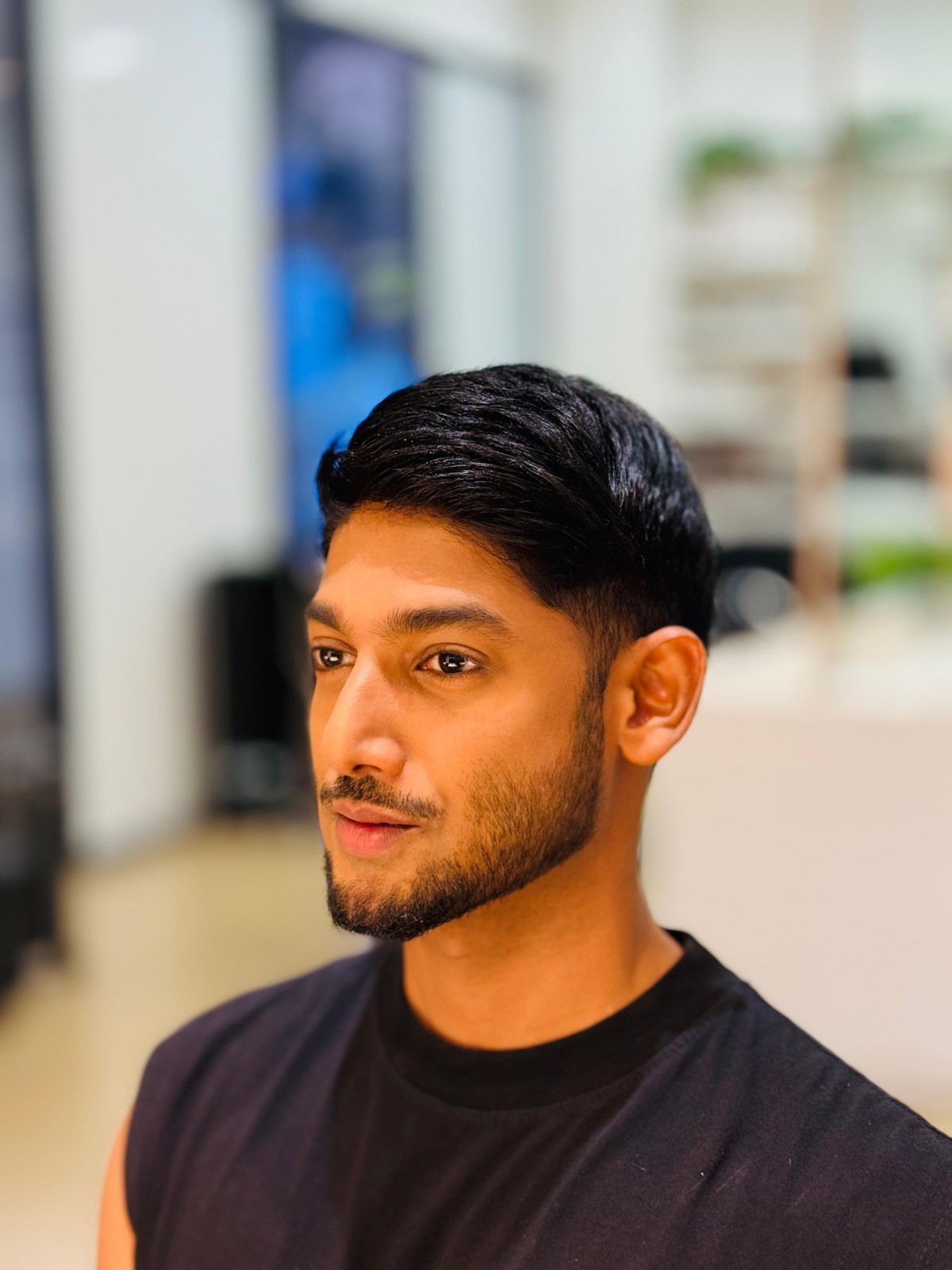 Classic men’s haircut and neatly shaped beard by Salon Nayana